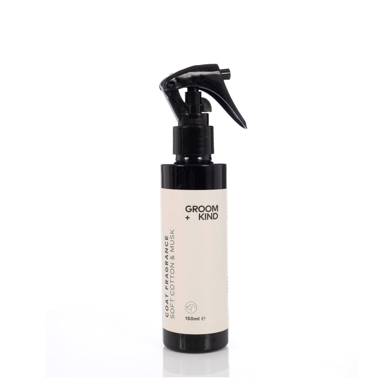Groom Kind coat fragrance spray bottle on a white background