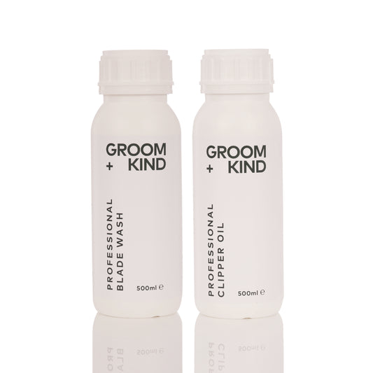 Two bottles of Groom + Kind Clipper Oil and Blade Wash products on a white background.