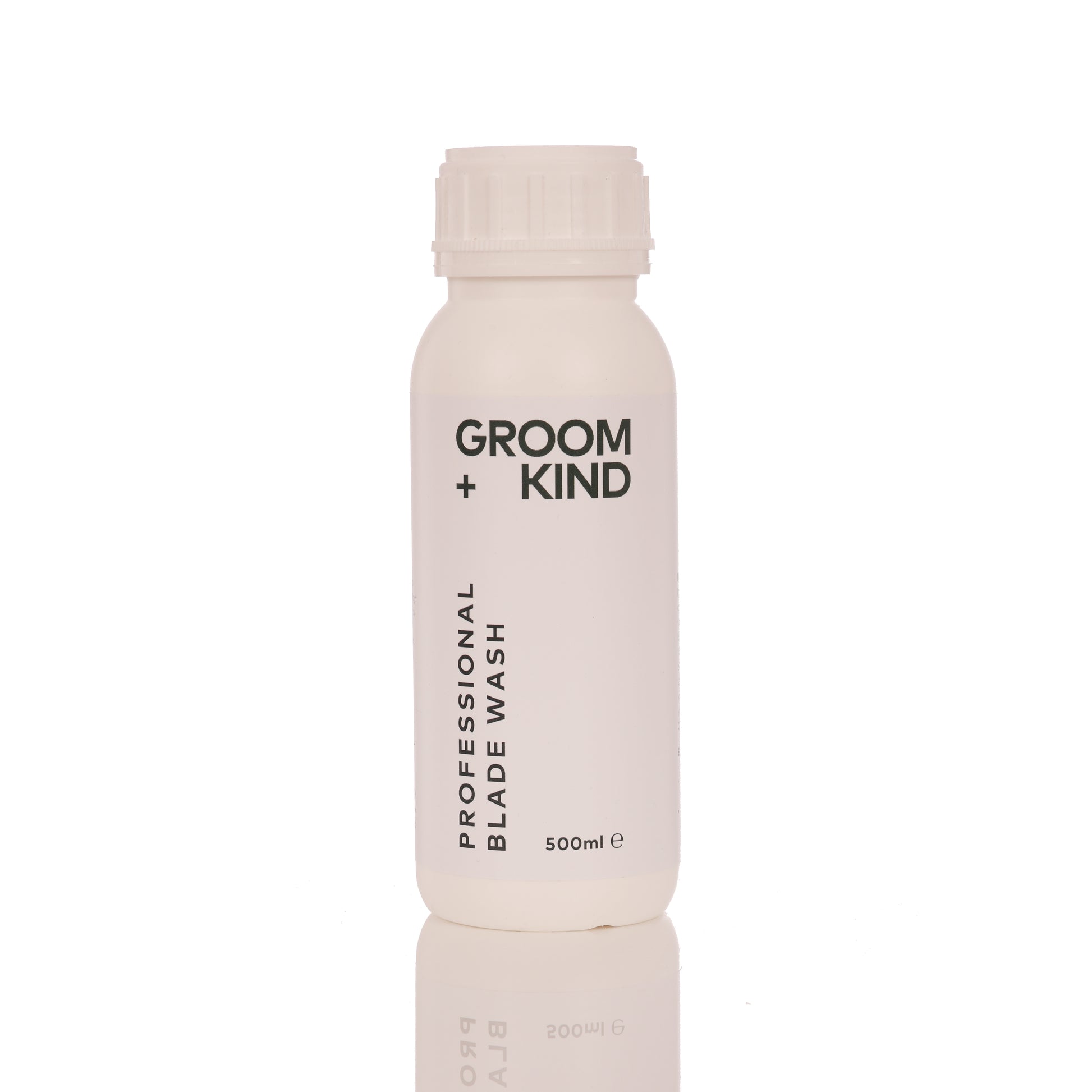 500ml bottle of Groom + Kind Blade Wash on a white background