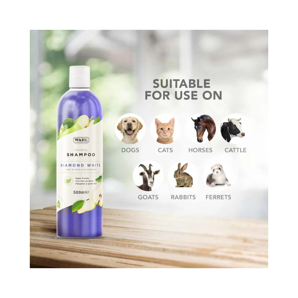 Wahl Diamond White 500ml Shampoo bottle with animal suitability chart on a wooden surface.