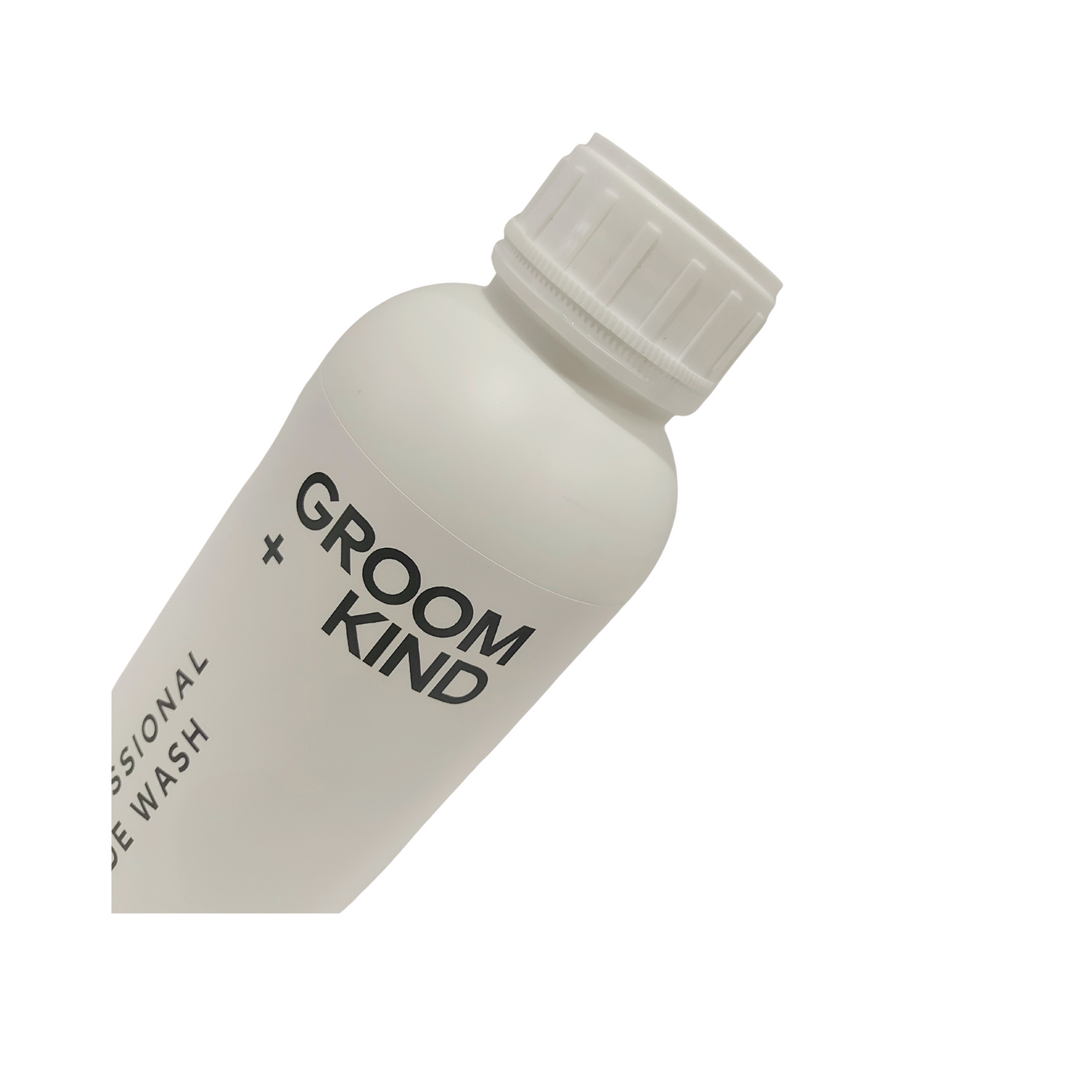 White bottle of blade wash with 'Groom Kind' branding on a white background